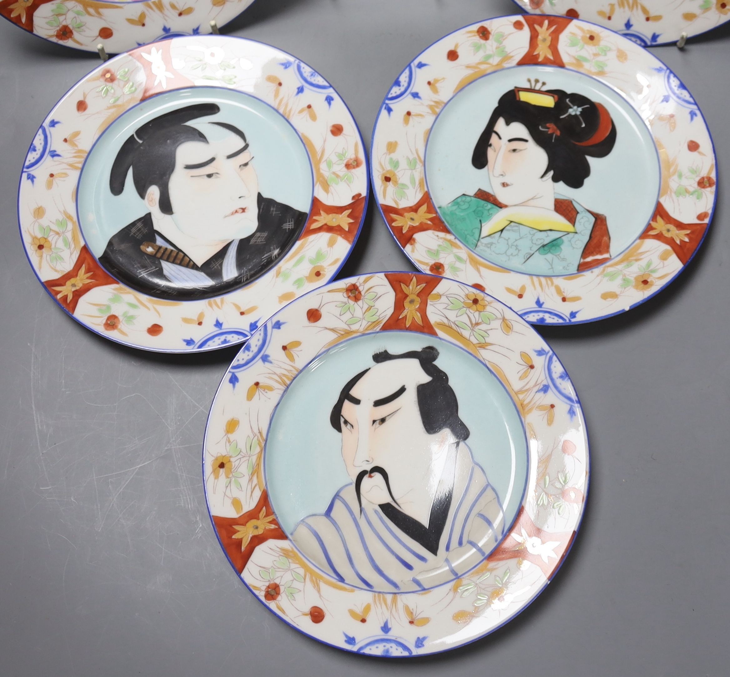 A set of six Japanese porcelain portrait plates, 20cm